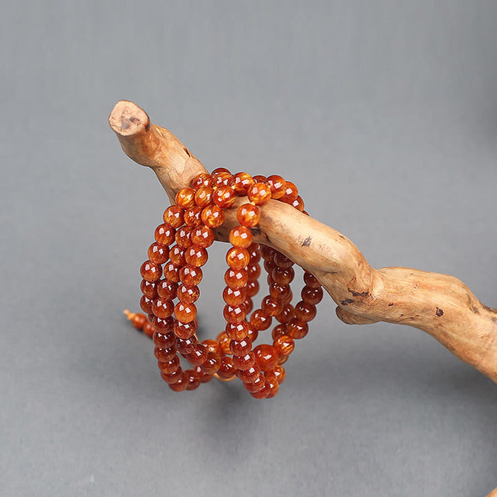Mala – Erfolg Bernstein Perlenarmband Holzgriff orange glänzend
