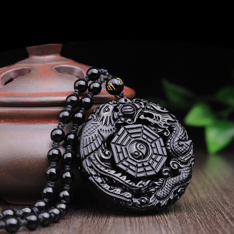 Obsidian Anhänger Drachen Phönix mit schwarzer Perlenket­te, Naturstein Schmuck
