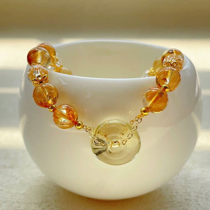 Armband Citrin Kristall Frieden Wohlstand goldene Perlen weiße Schale