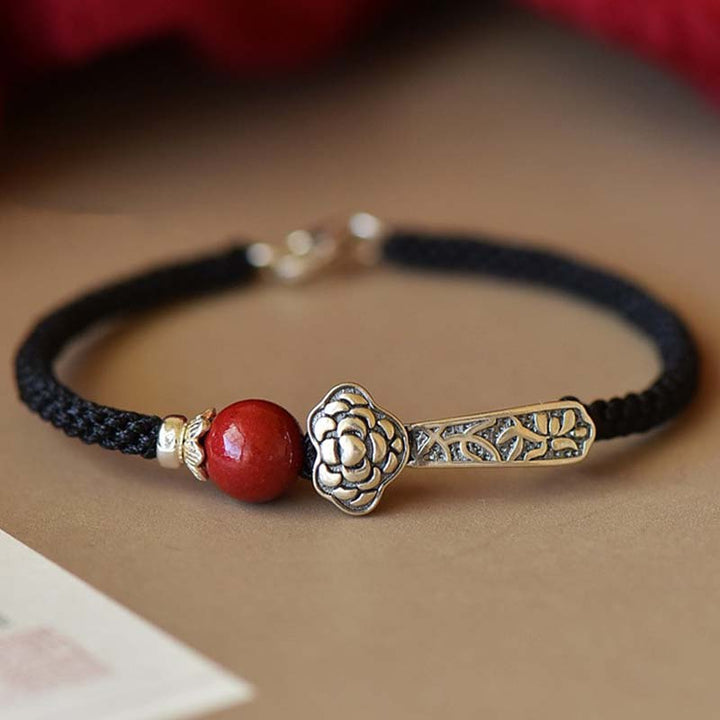 Armband 925 Silber Zinnober rotes Perlen-Charm Blüte schwarzes Textil