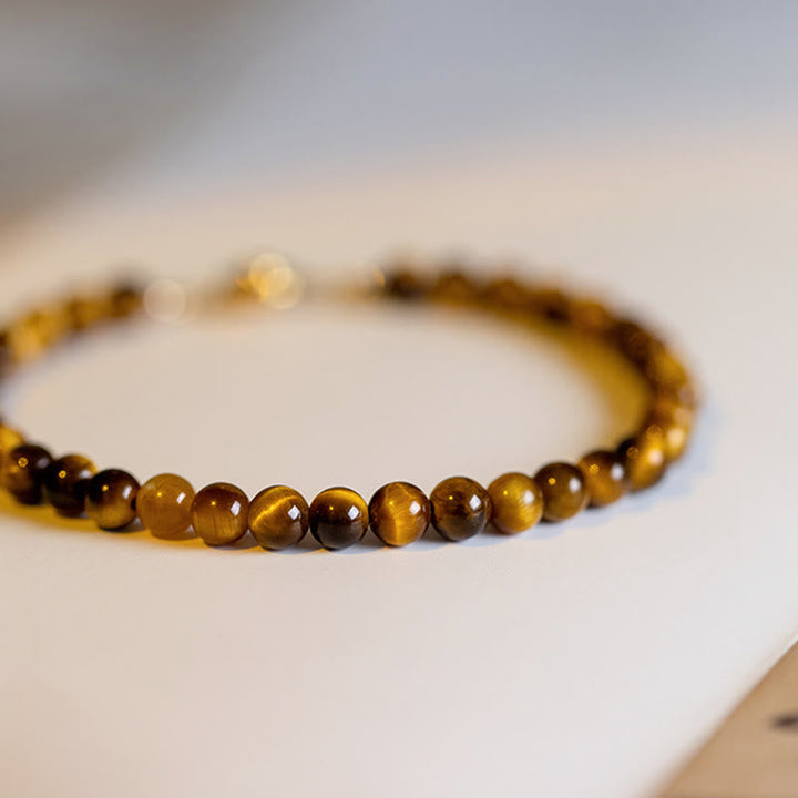 Armband Tigerauge – Schutz & Mut braune Perlen Nahaufnahme Produktfoto