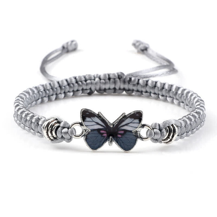 Armband Schmetterling – Liebe mit schwarzem Schmetterling Anhänger grau geflochten