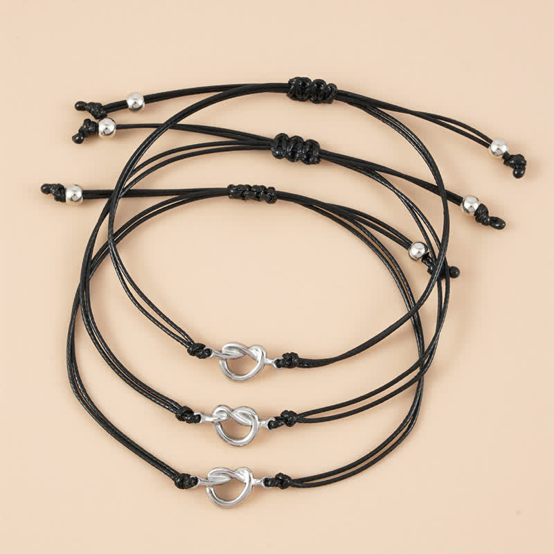 Schwarze Freundschafts-Armbänder mit silbernen Herz-Charms, Paar-Set.