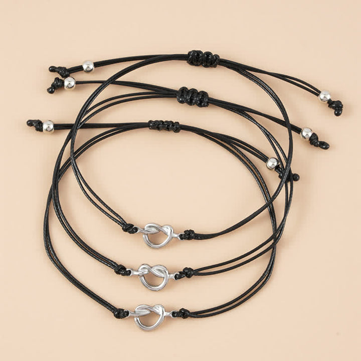 Schwarze Freundschafts-Armbänder mit silbernen Herz-Charms, Paar-Set.