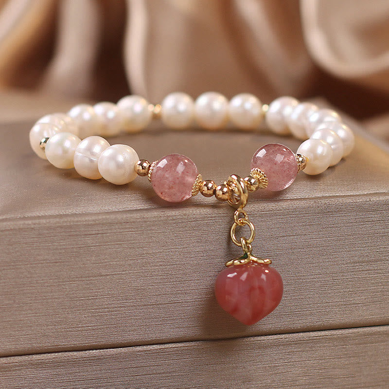 Armband Erdbeerquarz Perle – Liebe mit weißen Perlen und rotem Herzanhänger