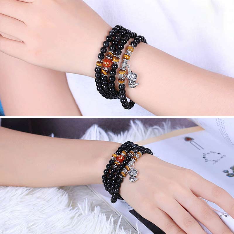 Schwarzer Obsidian Armband mit Tigerauge Perlen und Charm elastisch