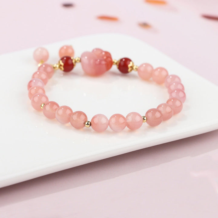 Rosaquarz Armband mit roten Achat Perlen gold Akzenten elegant