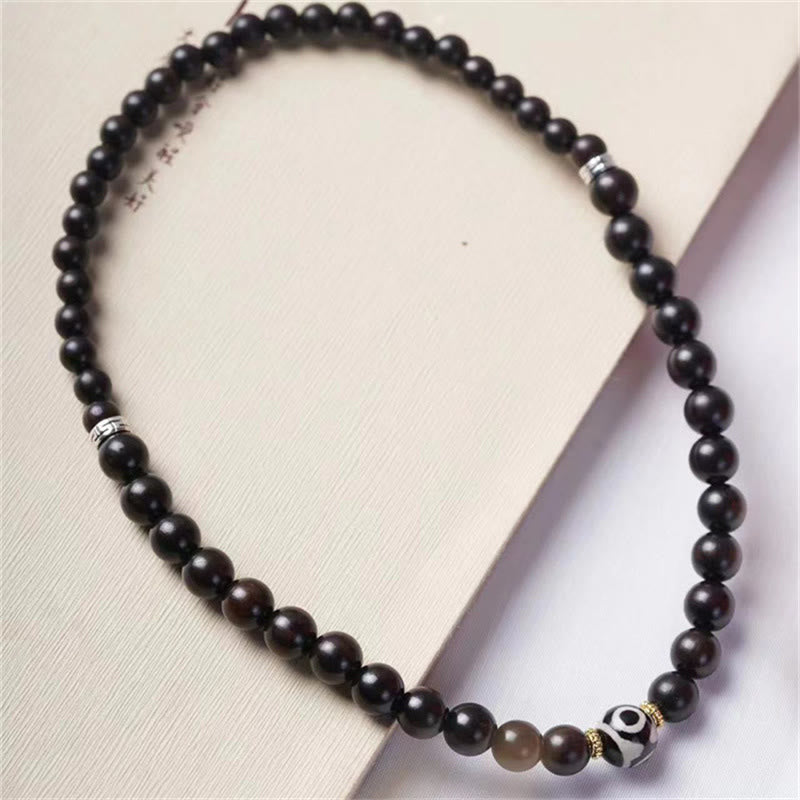 Armband Ebenholz Dzi – Balance & Schutz