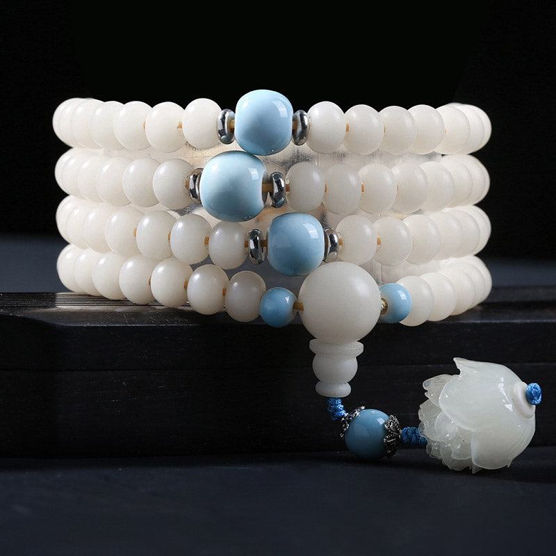 Armband Bodhi Lotus – Segen weiß blau Perlen elastisch Schmuck