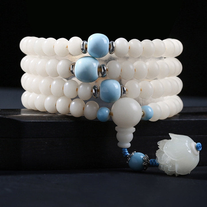 Armband Bodhi Lotus – Segen weiß blau Perlen elastisch Schmuck