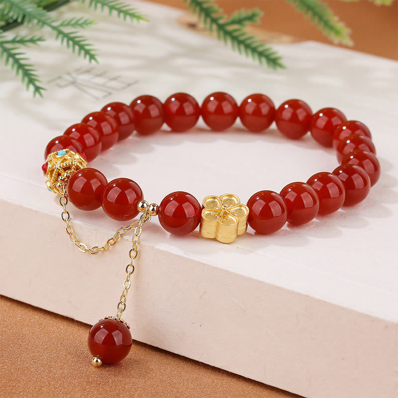 Armband Roter Achat Pfirsichblüte Gold Perlen elegant festlich getragen