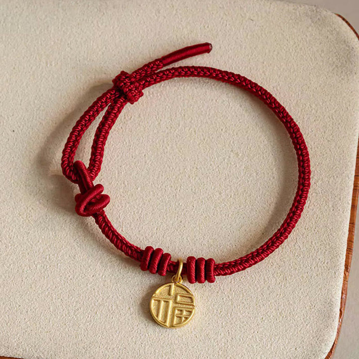 Rotes Armband mit goldenem Fu-Zeichen Anhänger Glück Frieden