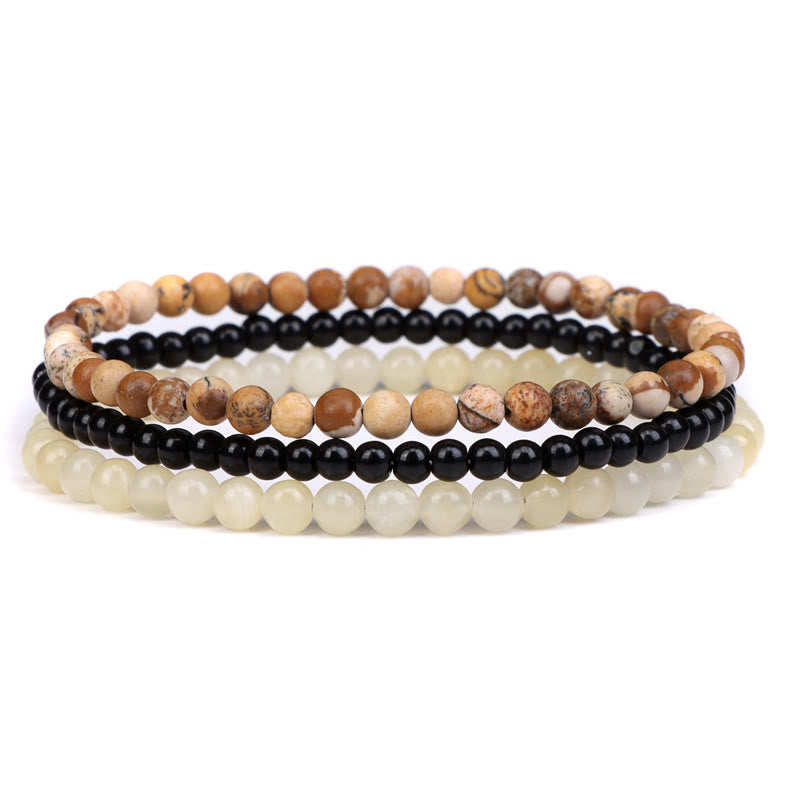 Armband Kristall – Frieden mit drei elastischen Perlenreihen Naturstein