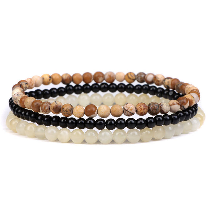 Armband Kristall – Frieden mit drei elastischen Perlenreihen Naturstein
