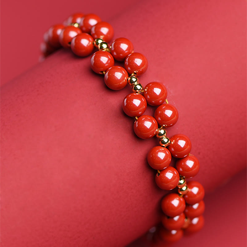 Armband Zinnober – Segen Harmonie rotes Perlenarmband Handgelenk getragen elegant