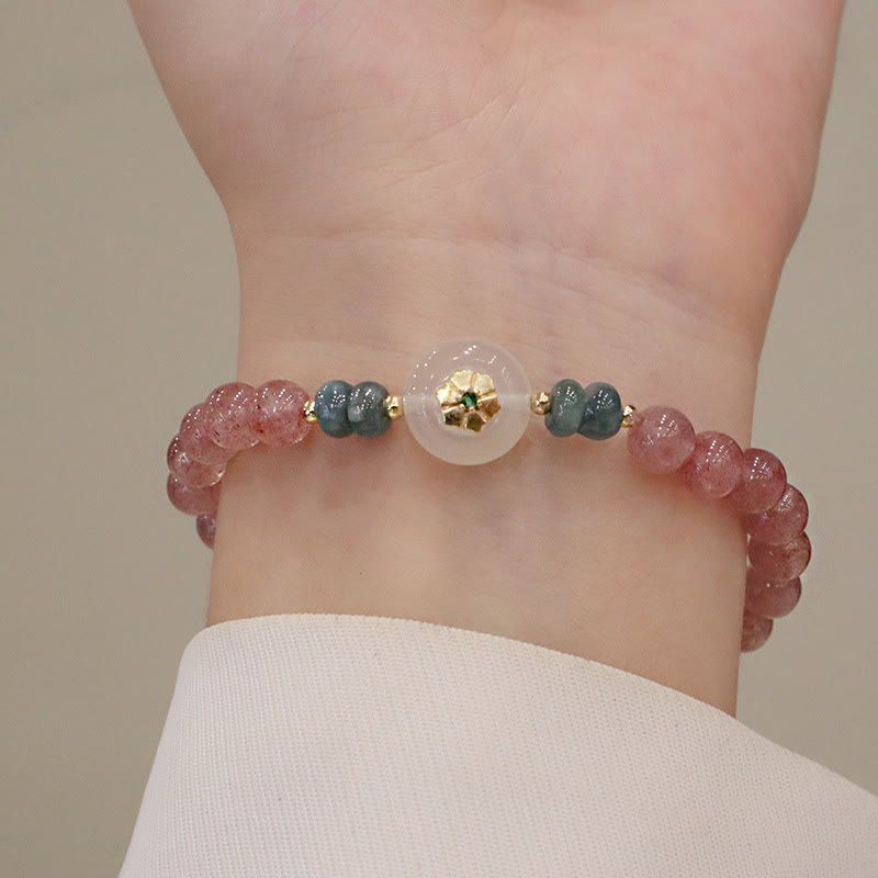 Armband Erdbeerquarz Jade Heilung Naturstein elastisch Handgelenk getragen