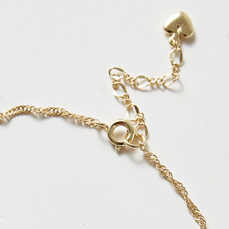 Goldkette Armband mit Herz Verschluss elegant minimalistisch Design.