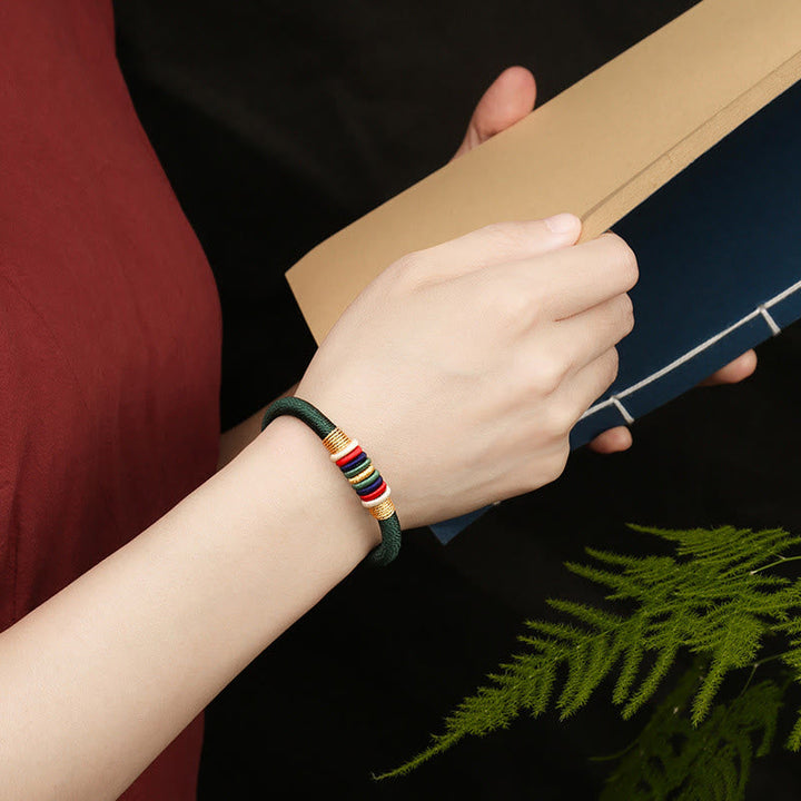 Armband Fünf Elemente – Glück & Energie grünes Textilarmband bunt verziert