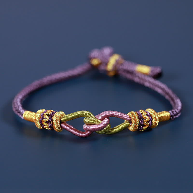 Armband Knotting Faith Stärke geflochten lila gold elegant Handgelenk getragen