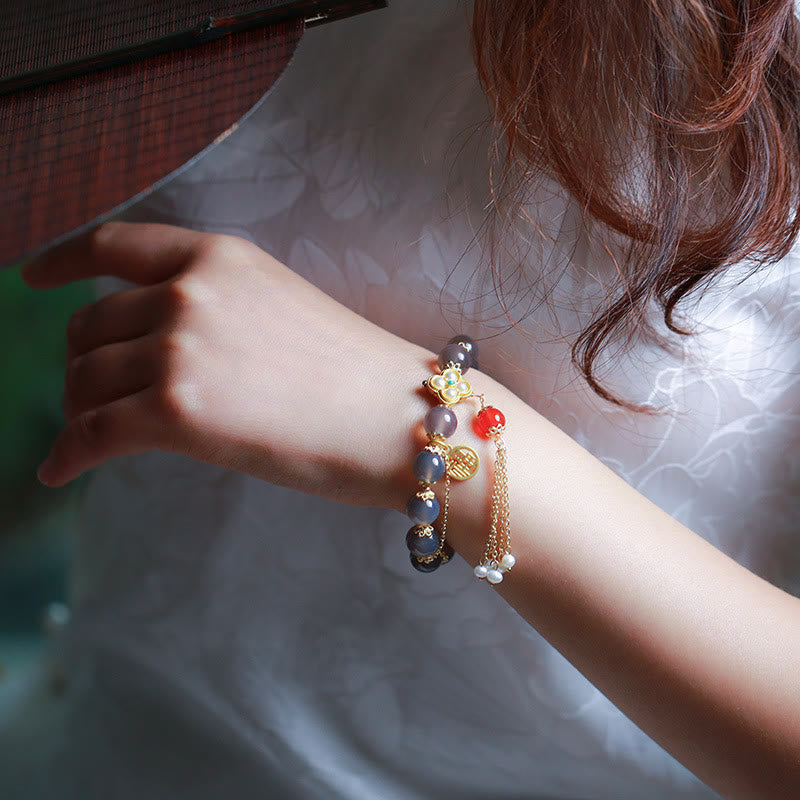 Armband Achat Perle Fu-Zeichen Balance am Handgelenk getragen Naturstein