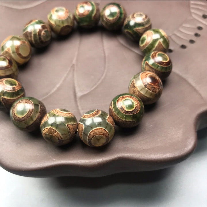 Armband Onyx – Glück grüner Naturstein mit goldenen Verzierungen elastisch