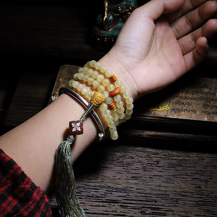 Mala Bernstein Glück Armband Handgelenk Bernsteinkugeln Quaste getragen