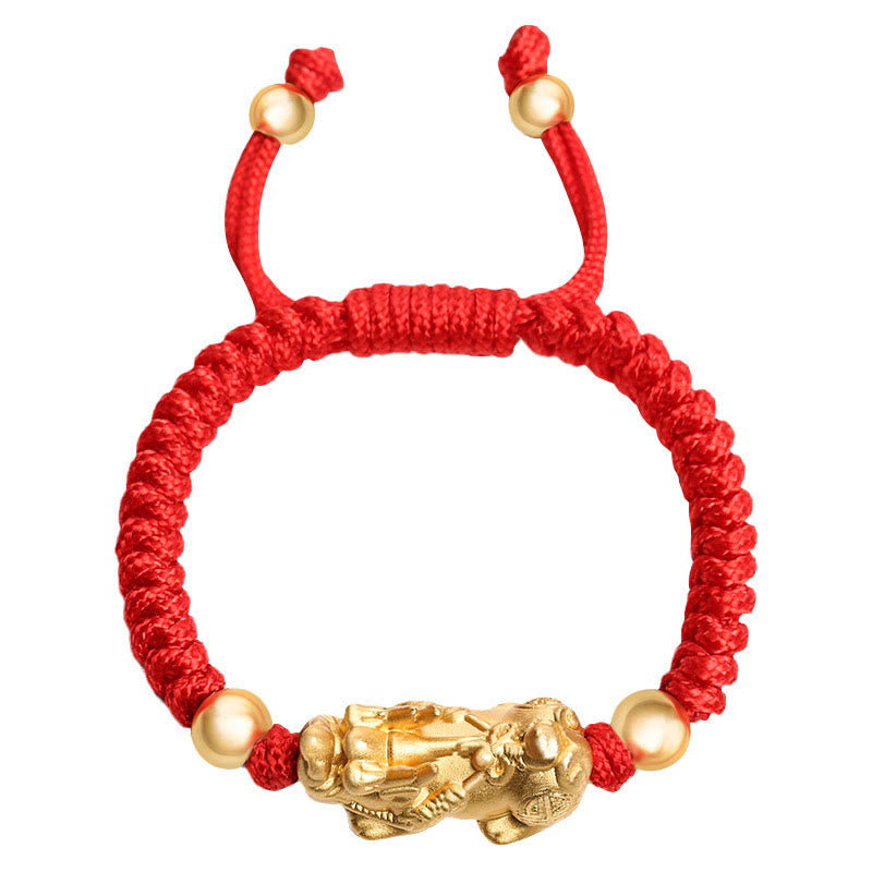 Rotes Armband mit goldenem Pixiu Glückscharme elastisch verstellbar.