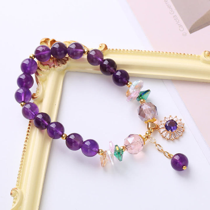 Armband Amethyst – Heilung mit lila Steinen und Kristallanhängern elegant.