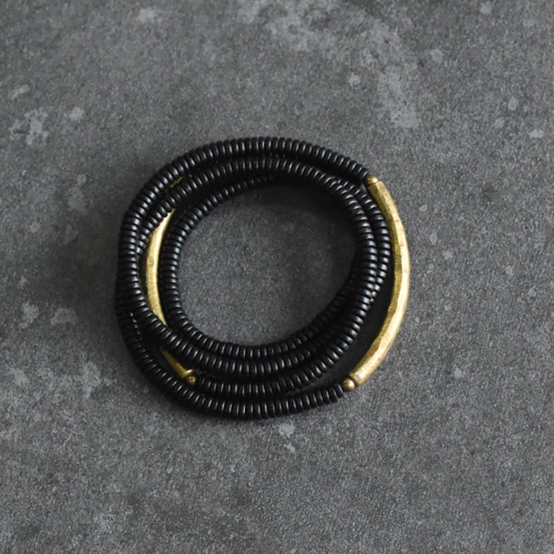 Armband Kupfer Ebenholz Balance schwarze Perlen Spirale elegant