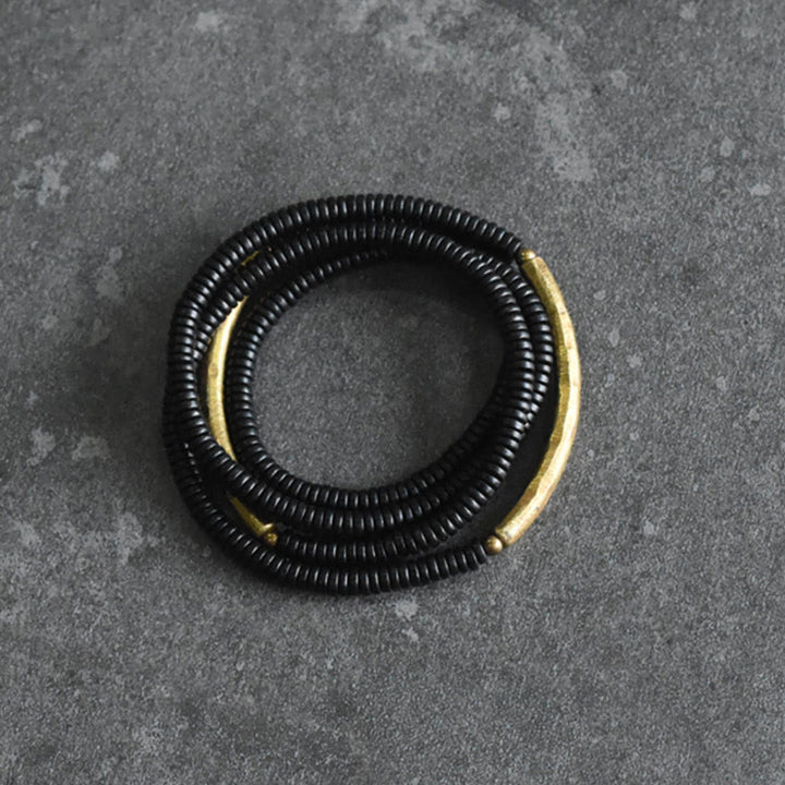 Armband Kupfer Ebenholz Balance schwarze Perlen Spirale elegant