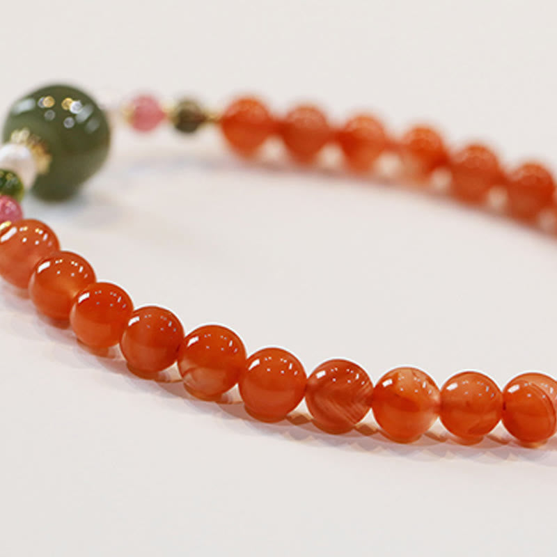 Armband Roter Achat Jade grüner Kopf Naturstein elastisch getragen