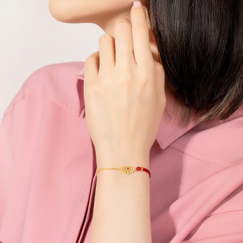 Goldenes Armband mit rotem Seidenfaden Glück Stärke Energie