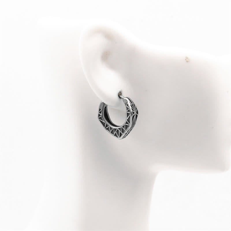 Ohrringe Titanstahl Wikinger Creolen Balance getragen Ohr Schmuck spirituell Boho