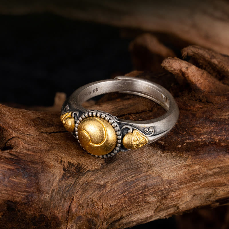 Silberner Ring 925 mit vergoldeter Kugel Balance Skelett Design