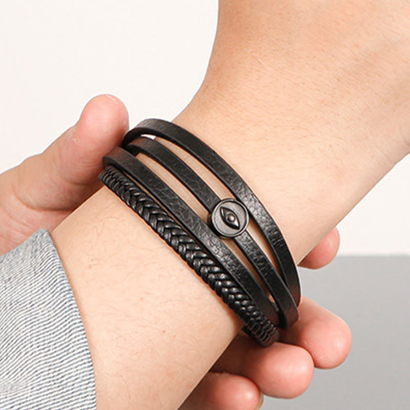 Armband Böses Auge Balance schwarzes Leder geflochten am Handgelenk getragen Schutz