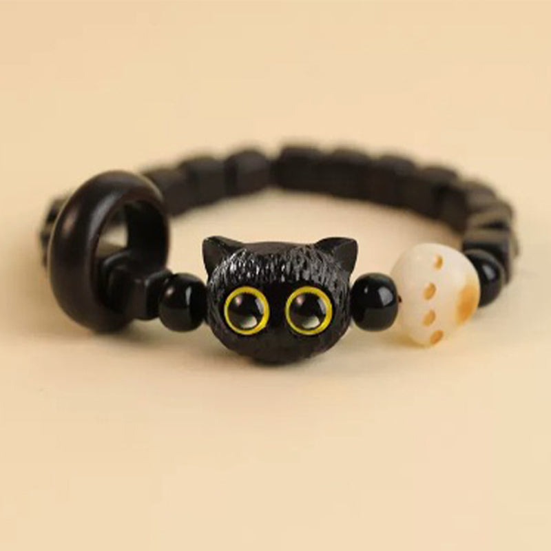 Armband Ebenholz Katze mit gelben Augen elastisch schwarz weiß