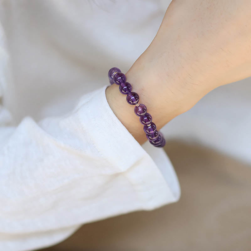 Amethyst Kristall Armband elastisch am Handgelenk getragen Naturstein lila