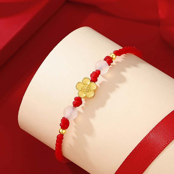 Rotes Armband mit Pfirsichblüte Charm und Rosenquarz Perlen elastisch