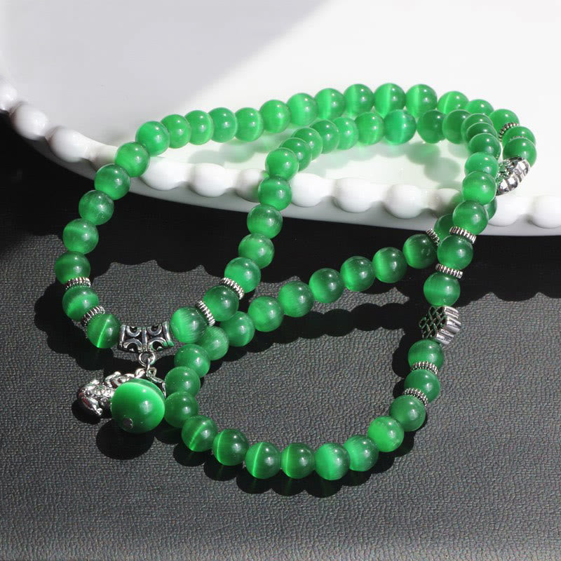 Grünes Katzenauge Armband PiXiu Dreifach elastisch Naturstein Handgelenk.