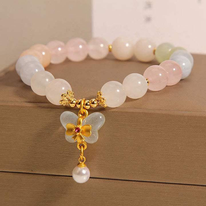 Armband Schmetterling – Balance mit Rosenquarz und Perlenhänger elegant.