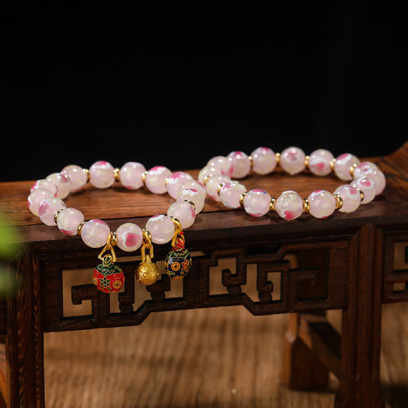 Rosenquarz Armband – Liebe & Segen mit goldenen Verzierungen Charme