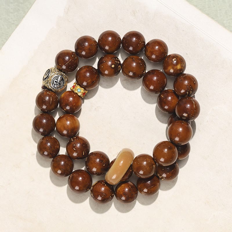 Armband Bodhi Wohlstand Balance braune Perlen Naturstein elegante Ausstrahlung