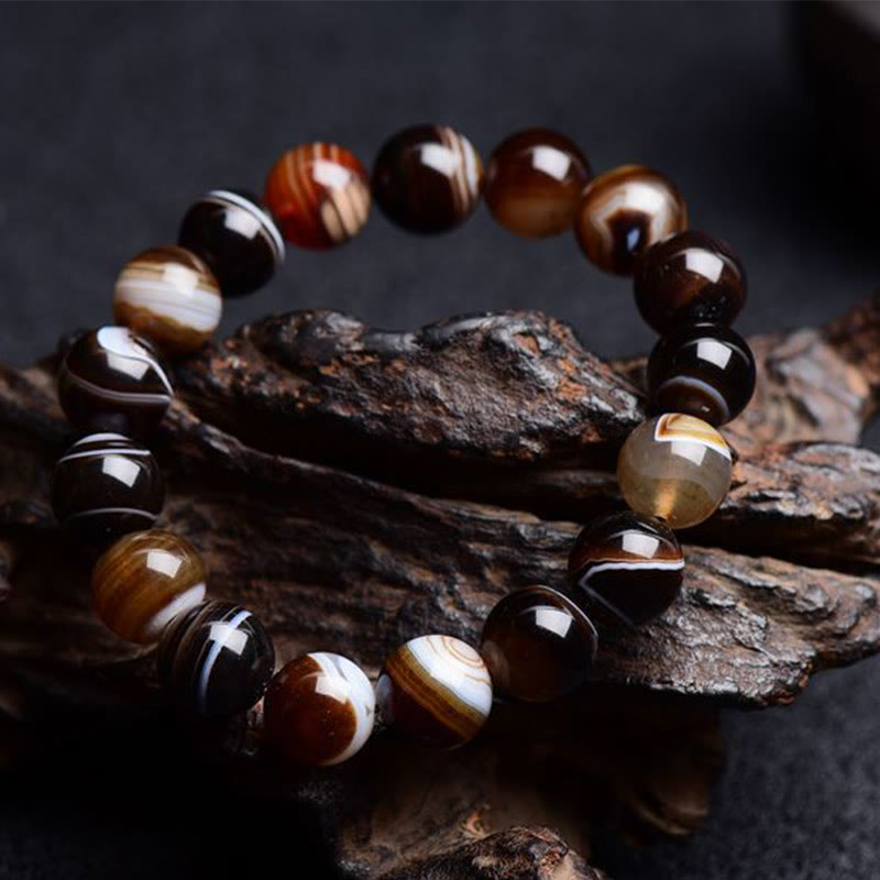 Armband Onyx – Glück Energie gestreift Naturstein braun glänzend elastisch