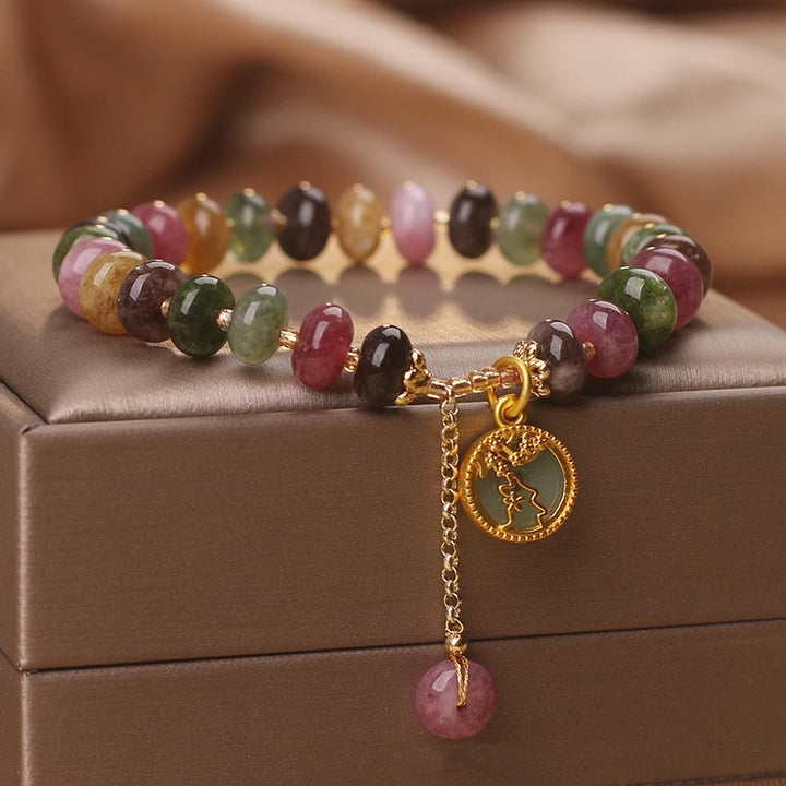 Buntes Turmalin Armband mit Blume Hase Anhänger elastisch tragbar