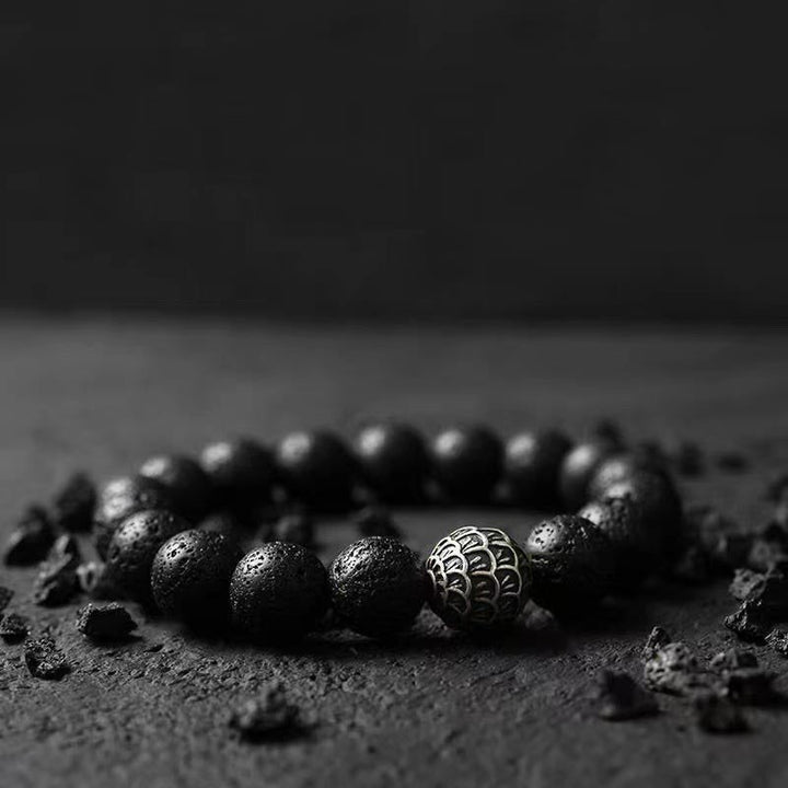 Armband Lavastein – Heilung mit silbernem Ornament Perlen schwarz