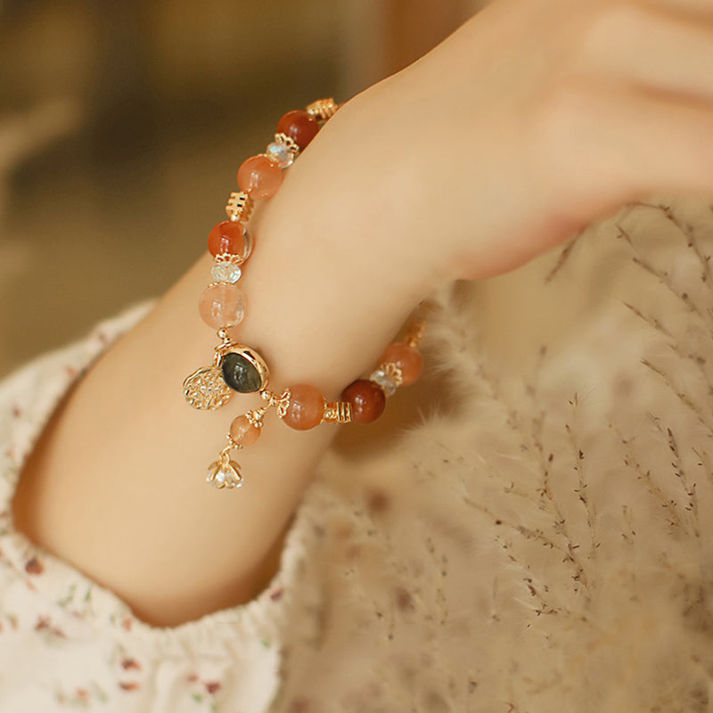 Rot-oranges Armband Stern – Wohlstand mit Natursteinen elegantes Design.