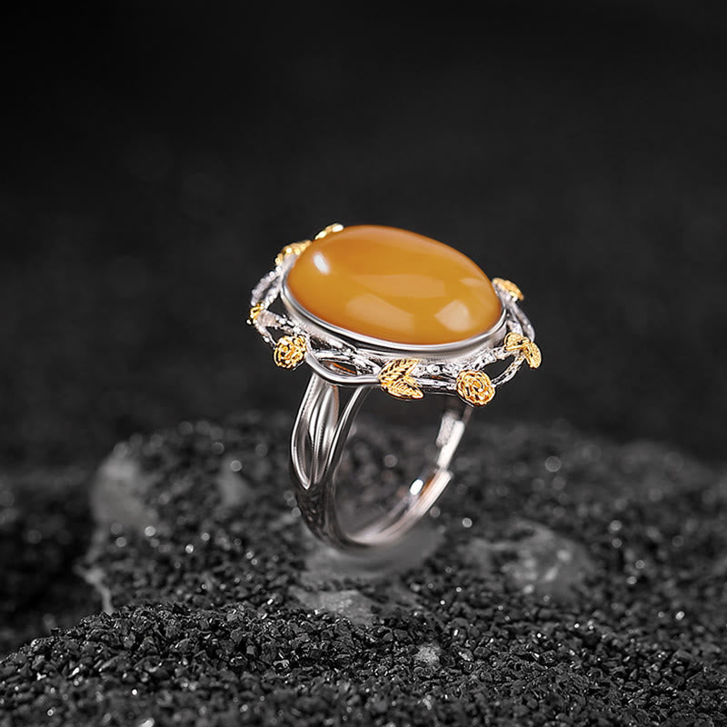 Bernstein Ring 925 Silber mit Goldakzenten, elegante Fassung für Klarheit