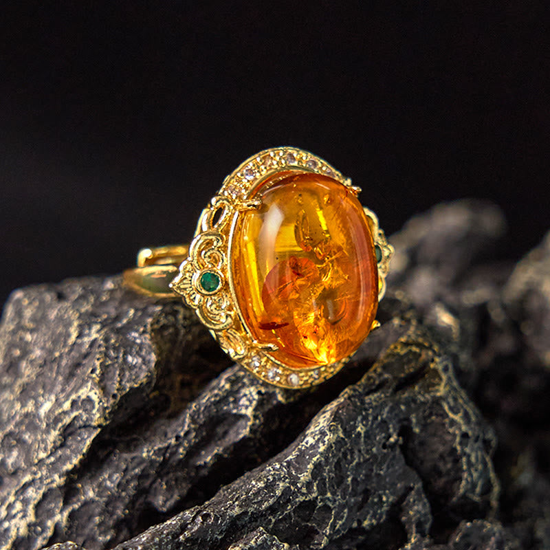 Bernsteinring mit Blume Taubenmuster Gold Filigran Klarheit Glücksbringer
