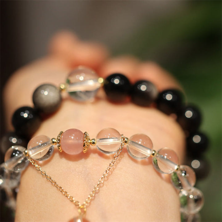 Armband Silber Obsidian Weißer Kristall Yin Yang Schutz am Handgelenk getragen