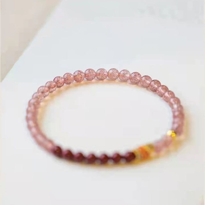 Armband Erdbeerquarz Zinnober Koi Fisch elastisch Naturstein rosa